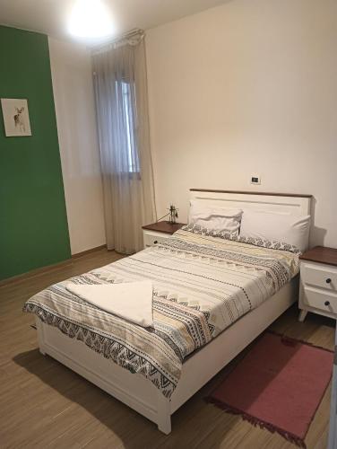 Llit o llits en una habitació de Shikury building