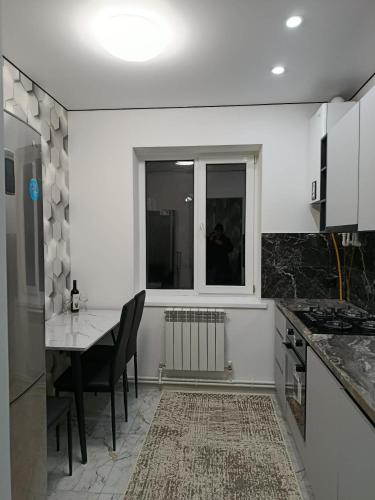 Kuhinja ili čajna kuhinja u objektu Квартира