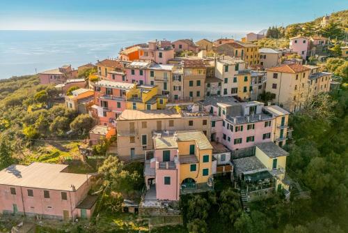 an aerial view of a town with the ocean at Sea Whisper Volastra in Volastra