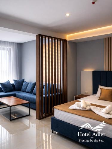 Ліжко або ліжка в номері Hotel Adler