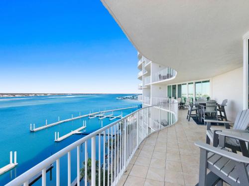 a balcony with a view of the water at Caribe The Resort #C702 in Perdido Key