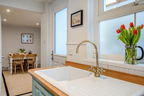 a kitchen with a sink and a window at 2 Bed in Bembridge oc-p34174 in Bembridge