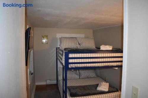 a group of bunk beds in a small room at North Creek All Season Rental in North Creek