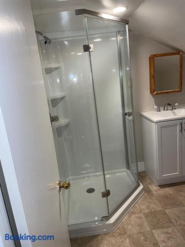 a shower stall in a bathroom with a sink at North Creek All Season Rental in North Creek