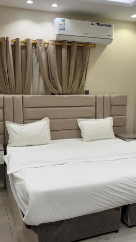 Llit o llits en una habitació de جوهرة السلام Salam hotil