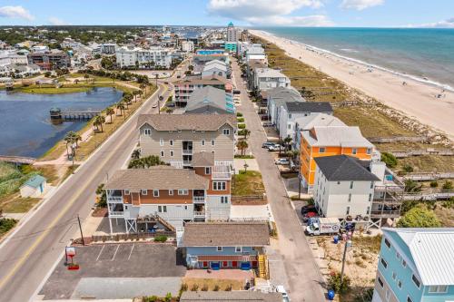 an aerial view of a beach with houses and the ocean at Vitamin Sea Suites 3 in Carolina Beach