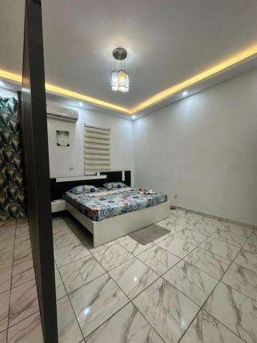 résidence studio meuble 객실 침대