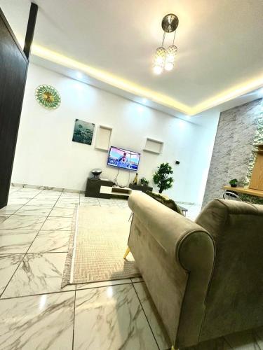 résidence studio meuble TV 또는 엔터테인먼트 센터