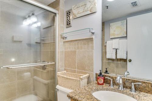 a bathroom with a sink and a shower at Gulf Highlands Getaway with 6 Pools and Beach Access in Gulf Shores