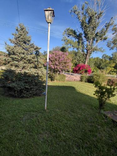 a light pole in the grass in a yard at Vallesito in Salsipuedes