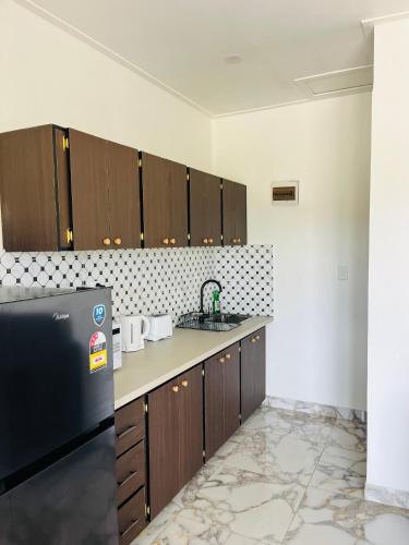 Cuina o zona de cuina de Pentaine Lodge
