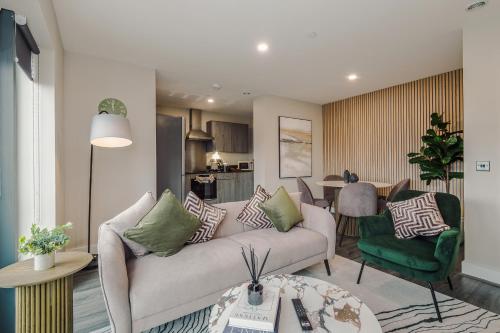 a living room with a couch and a table at Luxury 2-Bed Apt by Royal Albert Dock & M&S Arena in Liverpool