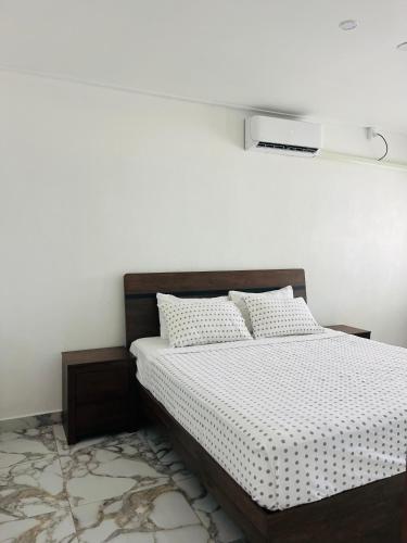 Llit o llits en una habitació de Pentaine Lodge