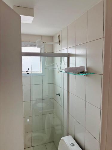 a bathroom with a shower and a toilet at Play Ilhotas - Centro Teresina in Teresina