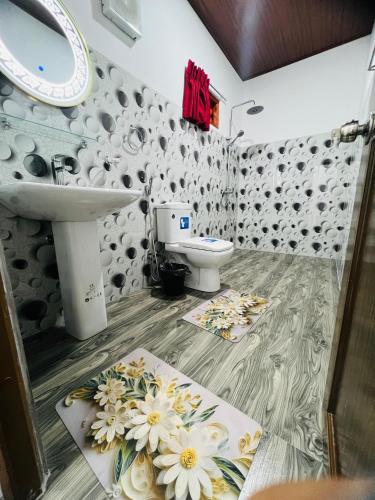 a bathroom with a sink and a toilet at Mount View Plaza - Ella Cottage with Mountain &Valley View in Ella