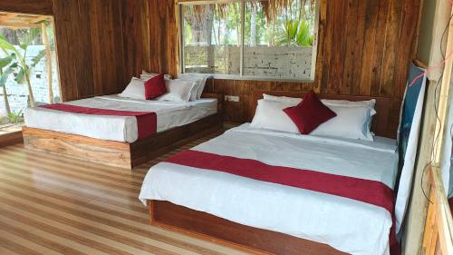 Llit o llits en una habitació de Sky Eco Resort