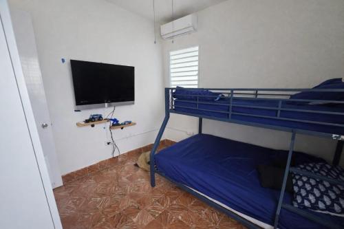Llit o llits en una habitació de Villa Zoed