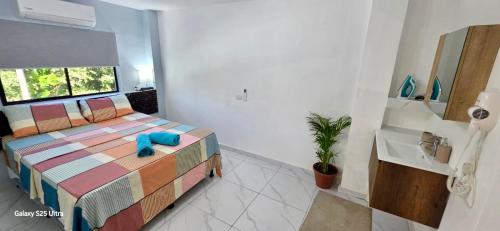 Postel nebo postele na pokoji v ubytování Evolution Home