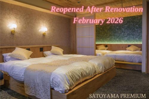 two beds in a room with a sign that says reopened after renovation at Yuzanso in Otsu