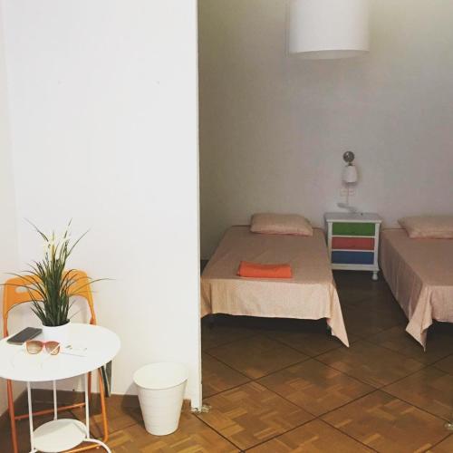 Postel nebo postele na pokoji v ubytování Barbieri Sol Hostel