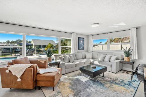 a living room with a couch and a table at 126 Deleon Rd in Cocoa Beach