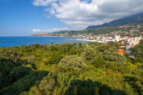 an aerial view of a city and the ocean at Royal Villas in Dobra Voda