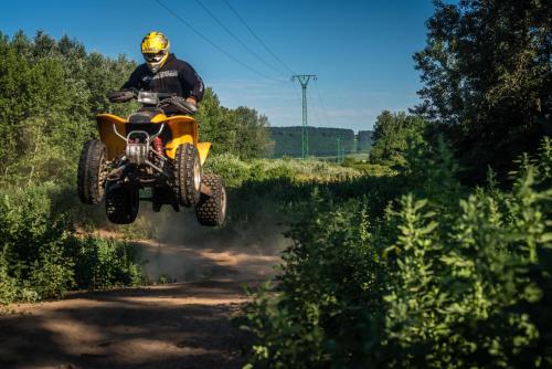 a person jumping a dirt bike in the air at Rezort u Bobiho in Nový Tekov