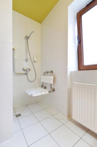 Koupelna v ubytování Hotel Pozyton