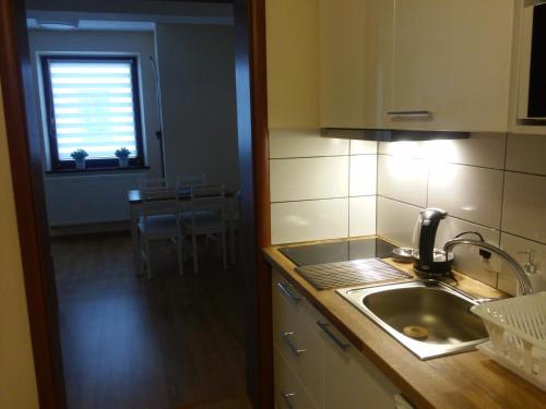 Kuchyňa alebo kuchynka v ubytovaní Apartament Akuratny Zakopane
