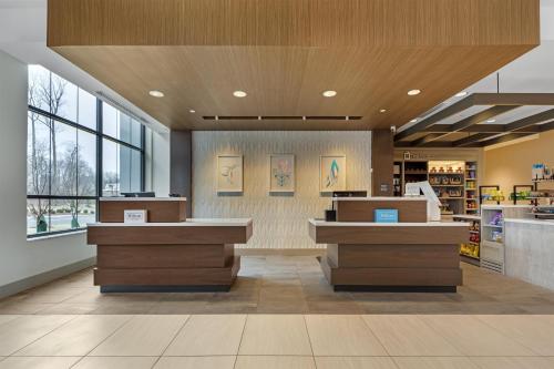 a store lobby with two counters in a store at Hilton Garden Inn Media in Media