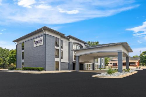 a rendering of a hotel with a parking lot at Spark by Hilton Alpharetta Roswell in Alpharetta