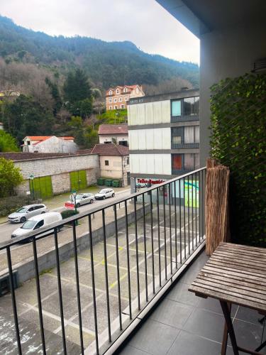 a balcony with a view of a parking lot at Retiro das Andorinhas - Gerês in Geres