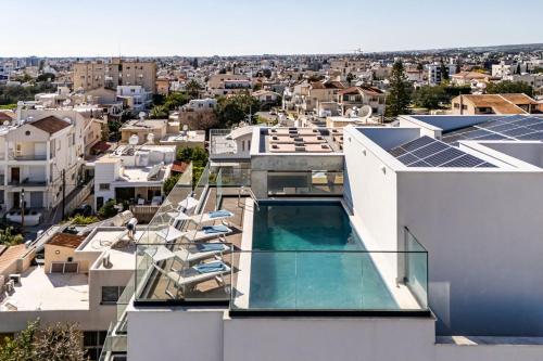 a house with a swimming pool on the roof at Piliou Premium Apartments in Limassol