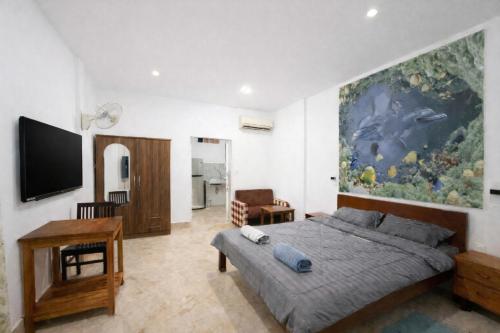 Televisyen dan/atau pusat hiburan di Expat Resort