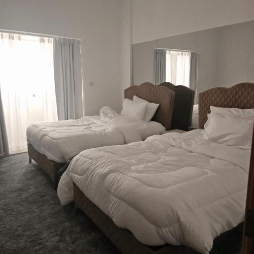 Llit o llits en una habitació de The White