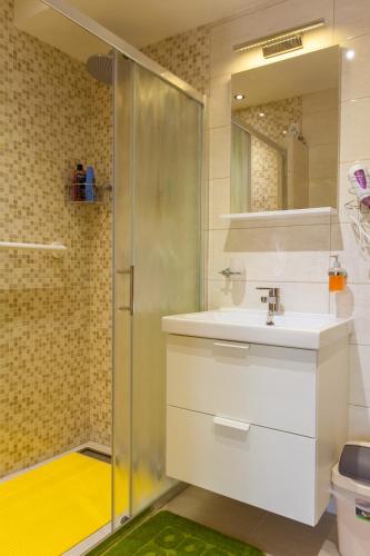 a bathroom with a sink and a shower at Apartment Dunja in Cres