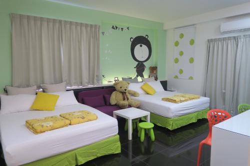 Postel nebo postele na pokoji v ubytování ChaoPingJia Fengge Guesthouse