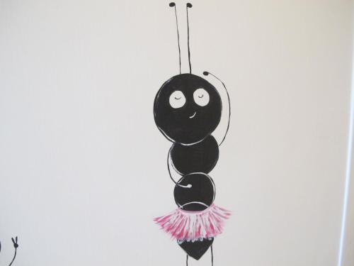 a black bird ornament hanging on a wall at ChaoPingJia Fengge Guesthouse in Wujie
