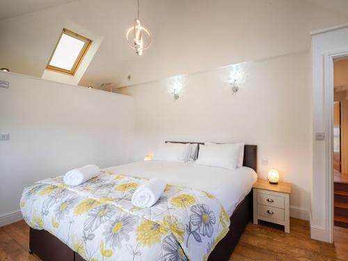 a bedroom with a large bed in a room at 4 Bed in Llandysul oc-66640 in Llandysul