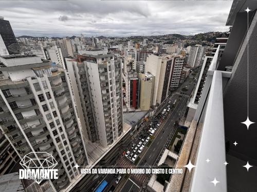 an overhead view of a city with tall buildings at Studio Diamante no CENTRO com piscina, academia e opção de vaga privativa in Juiz de Fora