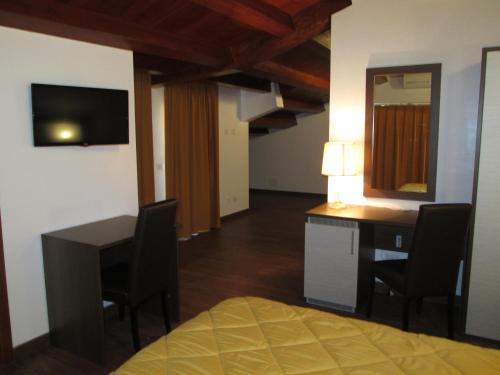 Μια τηλεόραση ή/και κέντρο ψυχαγωγίας στο B&B Elisir