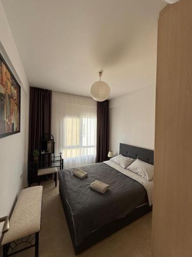 a bedroom with a large bed and a window at 2 Bedrooms At Caesar Resort & Spa Iskele Claudius 9 in Iskele
