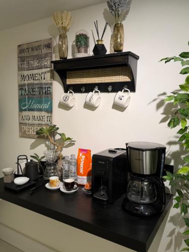 Kemudahan buat kopi dan teh di شاليه اند هوم
