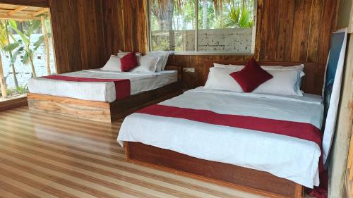 Llit o llits en una habitació de Sky Eco Resort