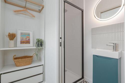 a bathroom with a shower and a sink at Beachway House in Weymouth