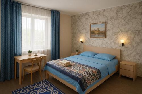 a bedroom with a bed and a desk and a window at CBT1 Hotel in Sary-Mogul