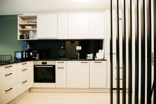 Foto Feel Home Apartments 301-Seesicht-Bergsicht-Parken 2