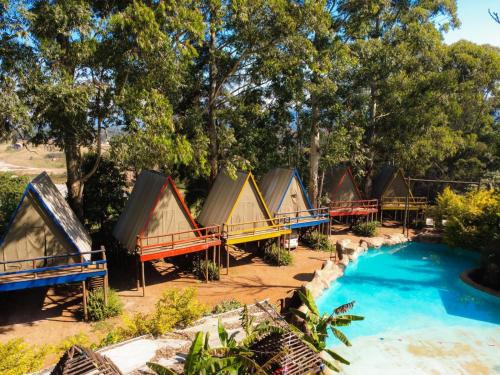 an overhead view of a group of huts and a pool at Beach Island Graskop in Graskop