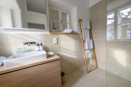 a bathroom with a sink and a mirror at Gut Purbach in Purbach am Neusiedlersee