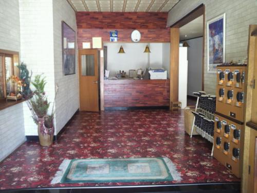 a hallway with a large room with a roomasteryasteryasteryasteryasteryasteryastery at Lodge Ueno Ski in Nozawa Onsen